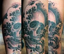 Skull and water tattoo 